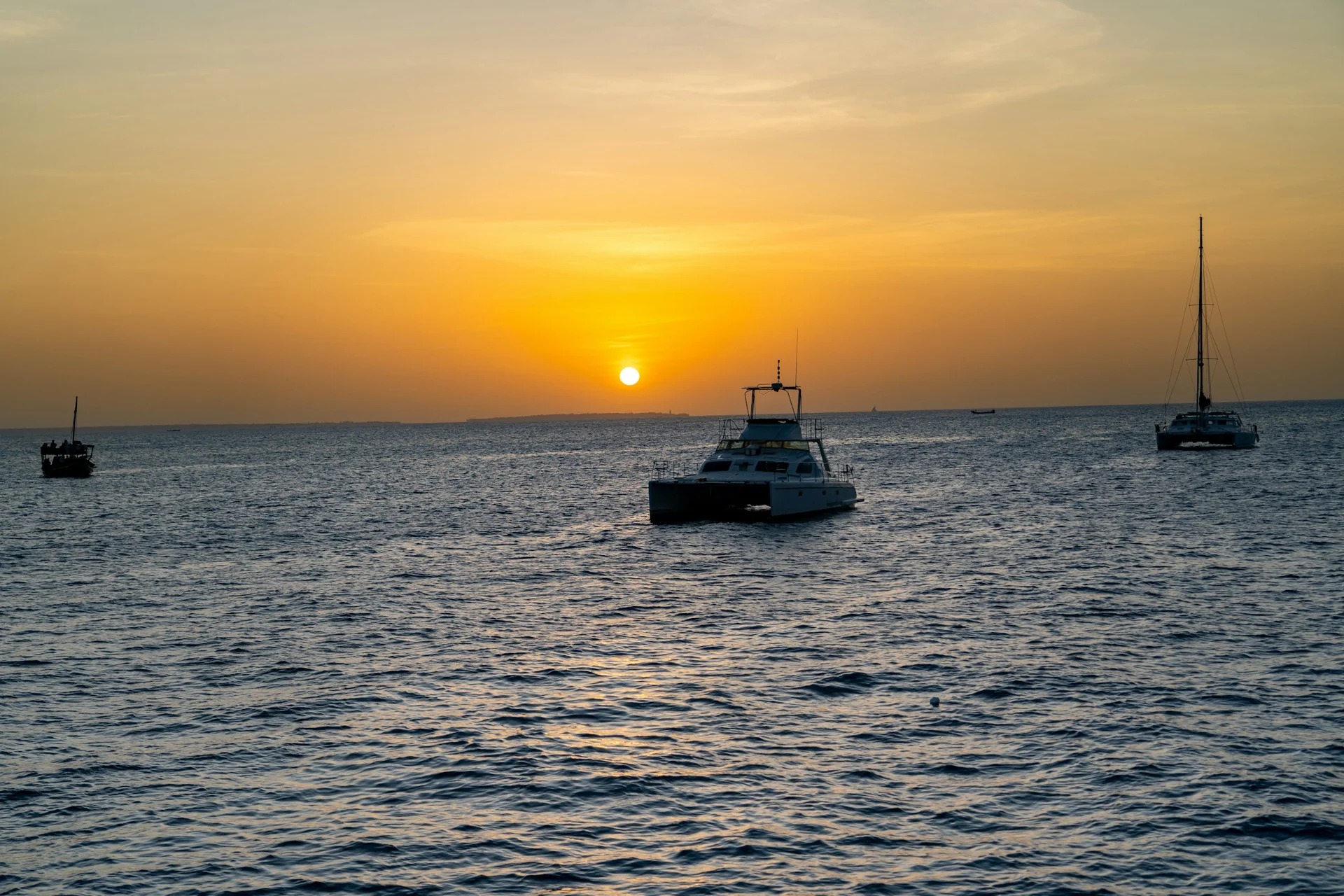 Sailboats on the Indian Ocean off Zanzibar at sunset